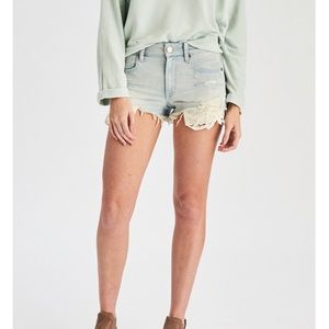 Jean shorts with crochet pocket detailing